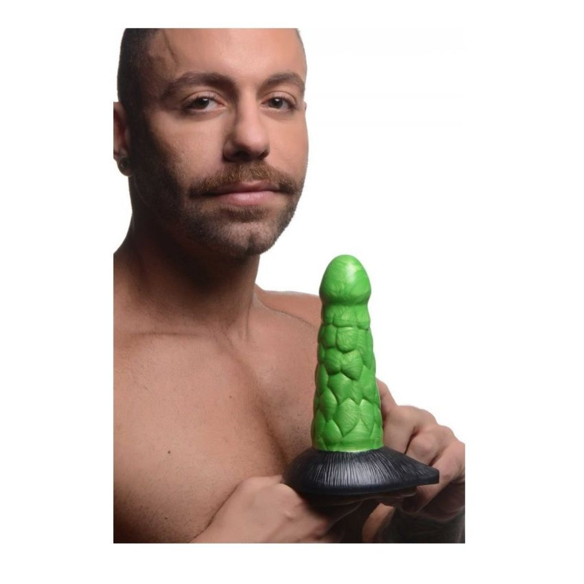 Male Model Holding Product -Creature Cocks Radioactive Reptile Thick Scaly Silicone Dildo Green - Simply Pleasure